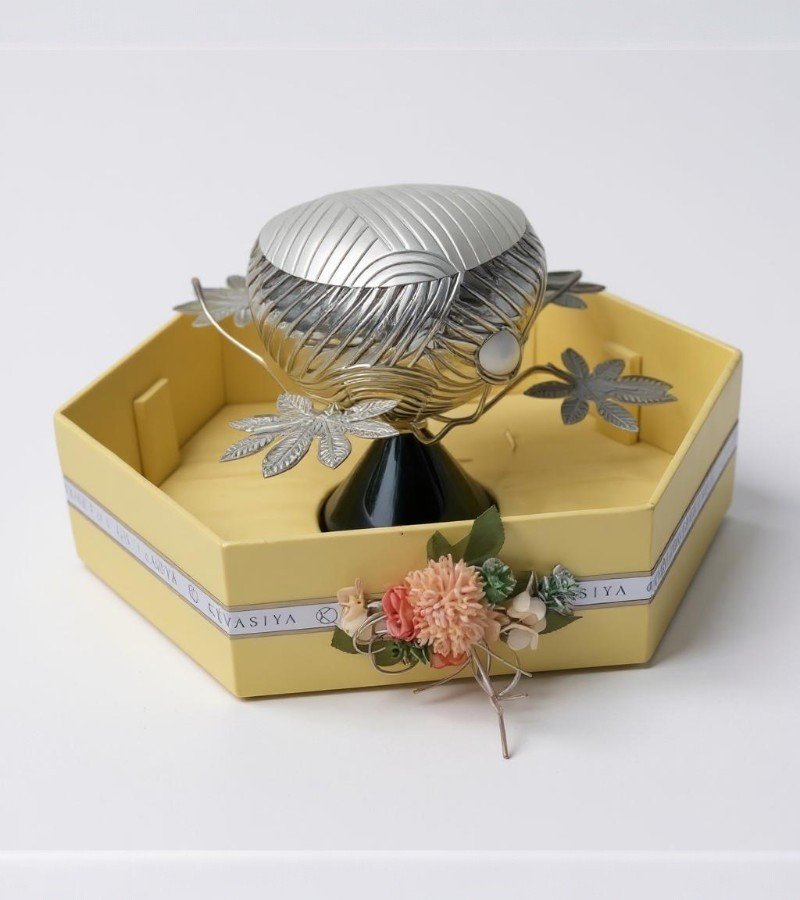 Silver Bowl Set on a Rich Green Base