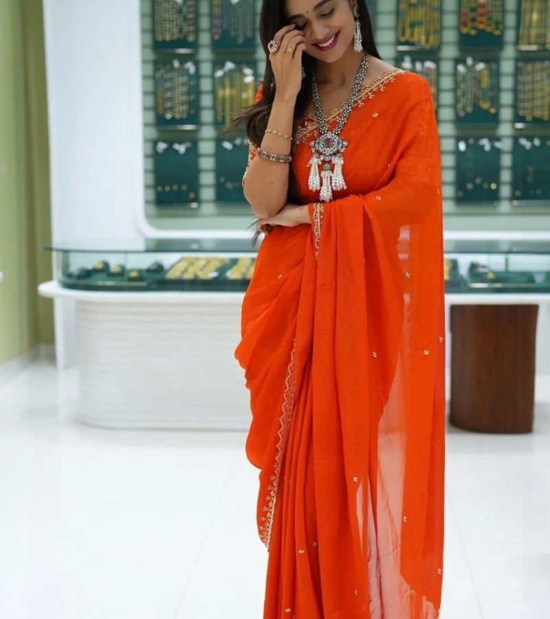 Classic Flame Orange Georgette Saree with Delicate Embellishments
