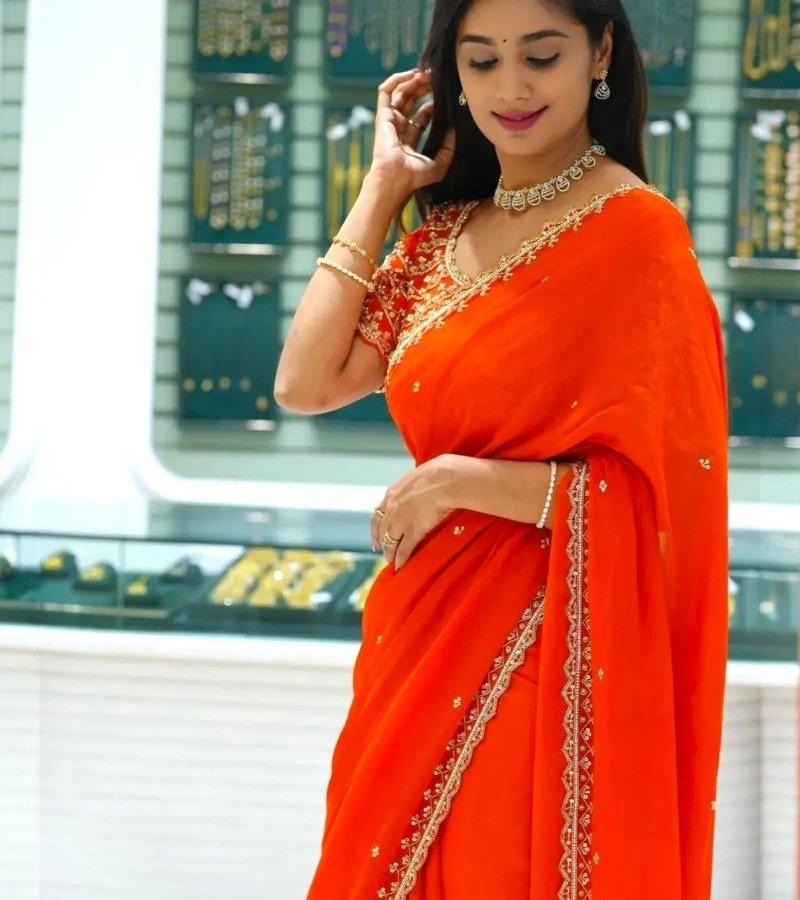 Classic Flame Orange Georgette Saree with Delicate Embellishments